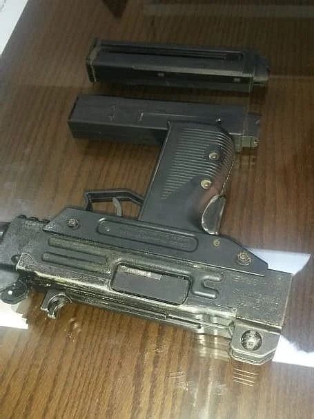 Detective Branch of police recover an Uzi pistol from a drug dealer