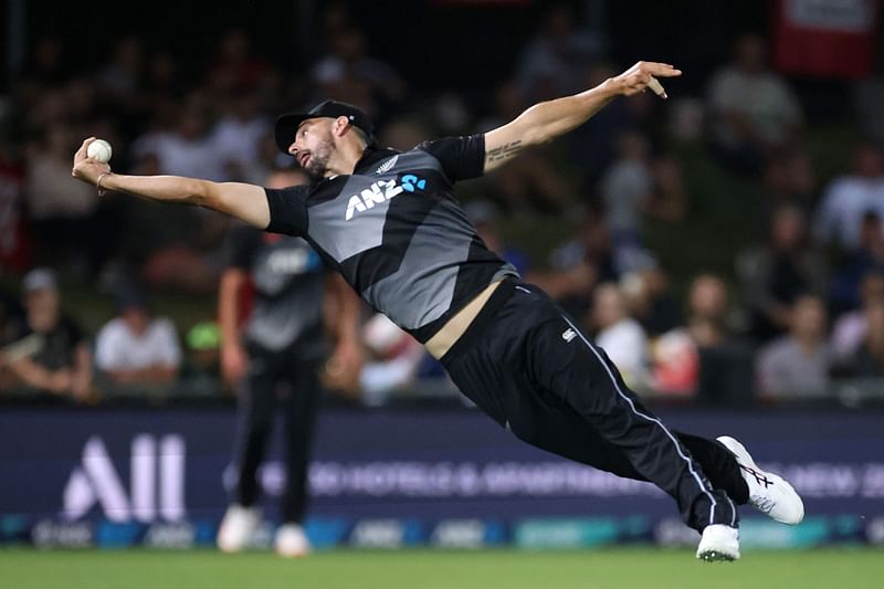 New Zealand's Daryl Mitchell takes a successful catch to dismiss Pakistan batsman Haider Ali during the third T20 cricket match between New Zealand and Pakistan at McLean Park in Napier on 22 December 2020