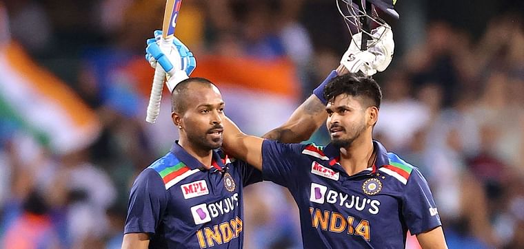  India's batsmen Hardik Pandya (L) and Shreyas Iyer celebrate the victory during the second T20 cricket match between Australia and India at the Sydney Cricket Ground in Sydney on 6 December 2020