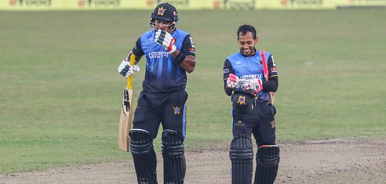 Mushfiqur Rahim (R) and Yasir Ali smile after ensuring the victory of Beximco Dhaka against Fortune Barishal at Sher-e-Bangla National Cricket Stadium, Mirpur, Dhaka on 2 December 2020