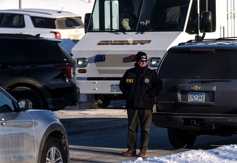 A member of the FBI is seen outside the Allina Health Clinic where a shooting took place earlier today on 9 February 2021 in Buffalo, Minnesota
