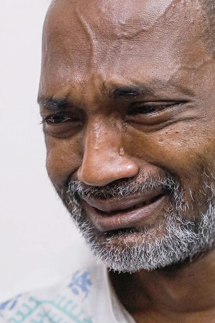 Cartoonist Ahmed Kabir Kishore breaks into tears while recounting the torture he went through