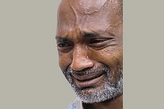 Cartoonist Ahmed Kabir Kishore breaks into tears while recounting the torture he went through