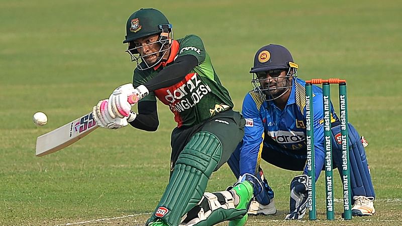 Bangladesh Cricket Board President Nazmul Hasan Confident Of Bio-Bubble Arrangement In Bangladesh-Sri Lanka Series 2 Bangladesh's wicketkeeper Mushfiqur Rahim (L) plays a shot as Sri Lanka's captain Kusal Perera looks on during the first one-day international (ODI) cricket match between Sri Lanka and Bangladesh at the Sher-e-Bangla National Cricket Stadium in Dhaka on 23 May 2021
