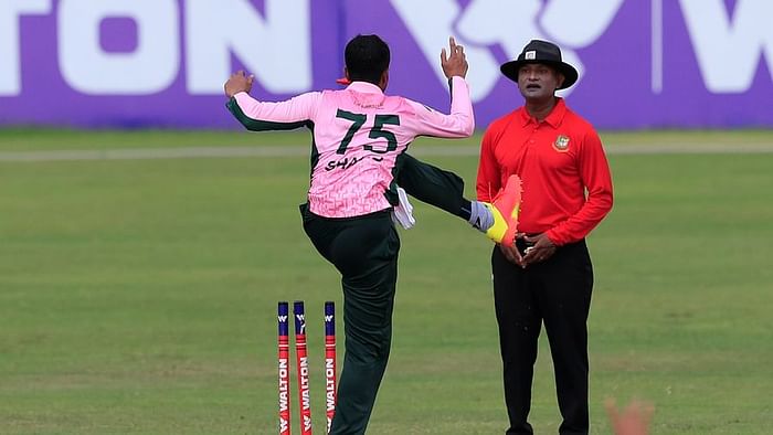 Shakib Al Hasan reacts after umpire turns down LBW appeal