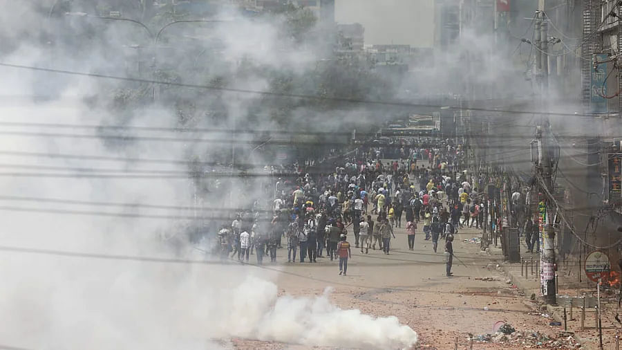 Police fired tear gas to disperse the students of Dhaka College and traders of New Market 