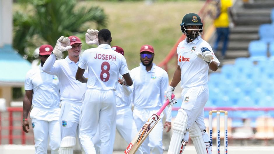  Tamim Iqbal (R) of Bangladesh walks off the field dismissed by Alzarri Joseph (2L) of West Indies during 1st day of the 2nd Test between Bangladesh and West Indies at Darren Sammy Cricket Ground, Gros Islet, Saint Lucia, on 24 June, 2022