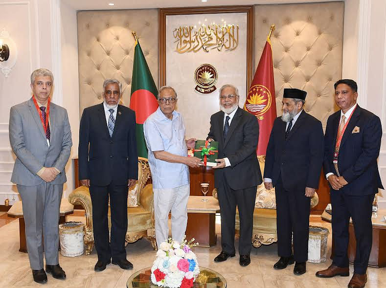 Law Commission chairman justice ABM Khairul Haque hands over the report to President Abdul Hamid while other members of the commission justice Md. Abu Bakar Siddiquee and justice ATM Fazle Kabir watch on 20 March 2023