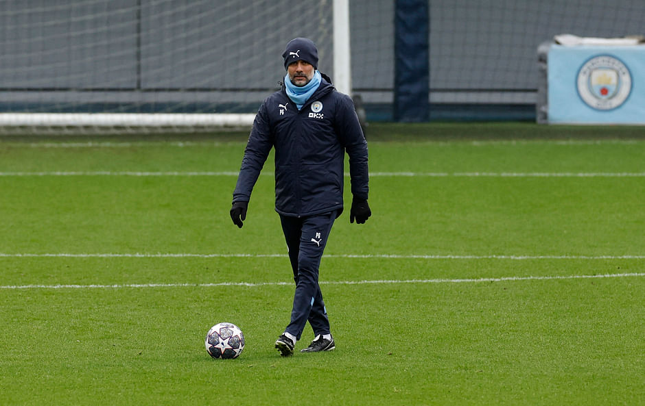 Manchester City manager Pep Guardiola during a training session at the Etihad Campus in Manchester, Britain on 13 March 2023