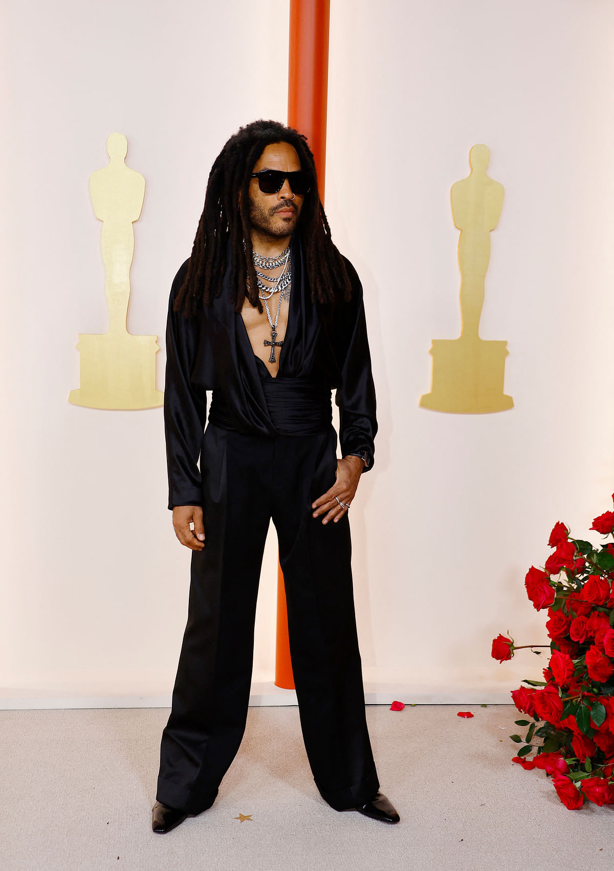 Lenny Kravitz poses on the champagne-colored red carpet during the Oscars arrivals at the 95th Academy Awards in Hollywood, Los Angeles, California, US, 12 March, 2023.