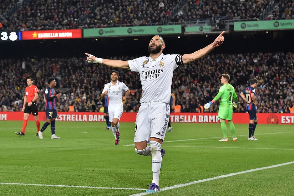 Real Madrid's French forward Karim Benzema celebrates after scoring his team's fourth goal