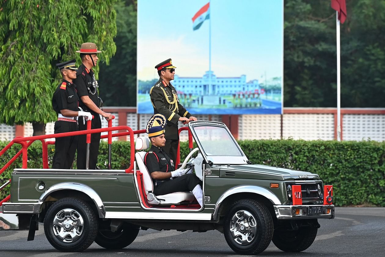 Chief of Army Staff (CAS) of the Bangladesh Army General SM Shafiuddin Ahmed (R) reviews cadets (unseen) standing in formation during a graduation ceremony at the Officers Training Academy (OTA) in Chennai on 29 April, 2023