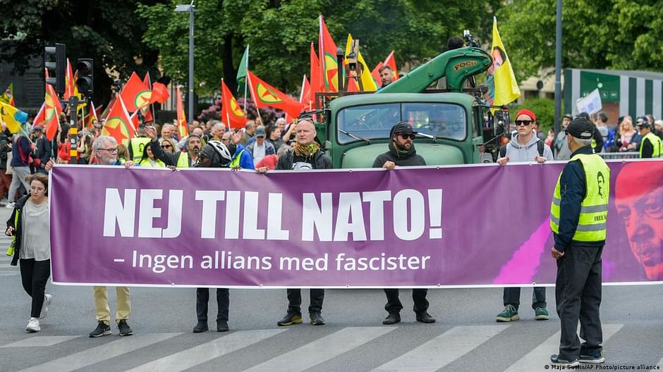 PKK flags (red with a red five-pointed star in a yellow circle in the center) were on prominent display during the demonstration in Stockholm