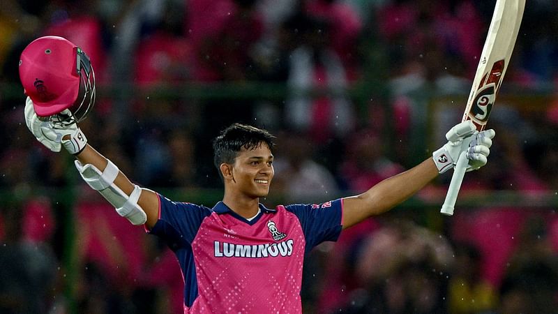 Rajasthan Royals' Yashasvi Jaiswal celebrates after scoring a century (100 runs) during the Indian Premier League (IPL) Twenty20 cricket match between Rajasthan Royals and Mumbai Indians at the Sawai Mansingh Stadium in Jaipur on April 22, 2024