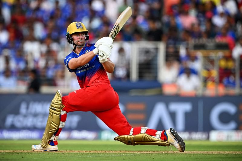 Royal Challengers Bengaluru's Will Jacks plays a shot during the Indian Premier League (IPL) Twenty20 cricket match between Gujarat Titans and Royal Challengers Bengaluru at the Narendra Modi Stadium in Motera on April 28, 2024