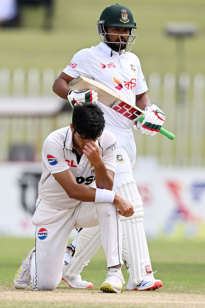 Pakistan’s Mir Hamza (L) reacts after Bangladesh’s captain Najmul Hossain Shanto plays a boundary during the fifth and final day of the second and last Test cricket match between Pakistan and Bangladesh, at the Rawalpindi Cricket Stadium in Rawalpindi on 3 September 2024