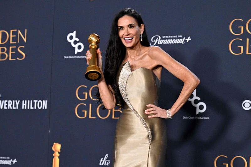 US actress Demi Moore poses with the Best Performance by a Female Actor in a Motion Picture – Musical or Comedy award for 'The Substance' in the press room during the 82nd annual Golden Globe Awards at the Beverly Hilton hotel in Beverly Hills, California, on 5 January, 2025.