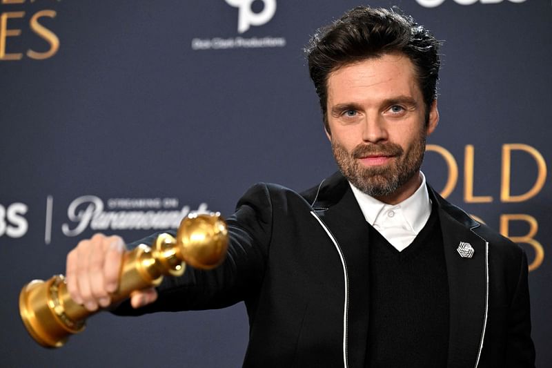 US actor Sebastian Stan poses with the Best Performance by a Male Actor in a Motion Picture – Musical or Comedy award for 'A Different Man' in the press room during the 82nd annual Golden Globe Awards at the Beverly Hilton hotel in Beverly Hills, California, on 5 January, 2025.