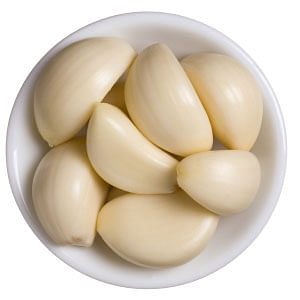 Peeled garlic cloves. File photo