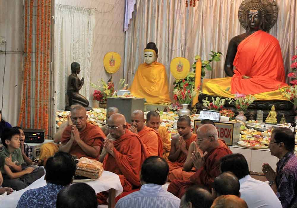 Buddhists take part in a prayer session at Basabo Buddhist Temple in Dhaka on Tuesday marking Buddha Purnima. Photo: Focus Bangla