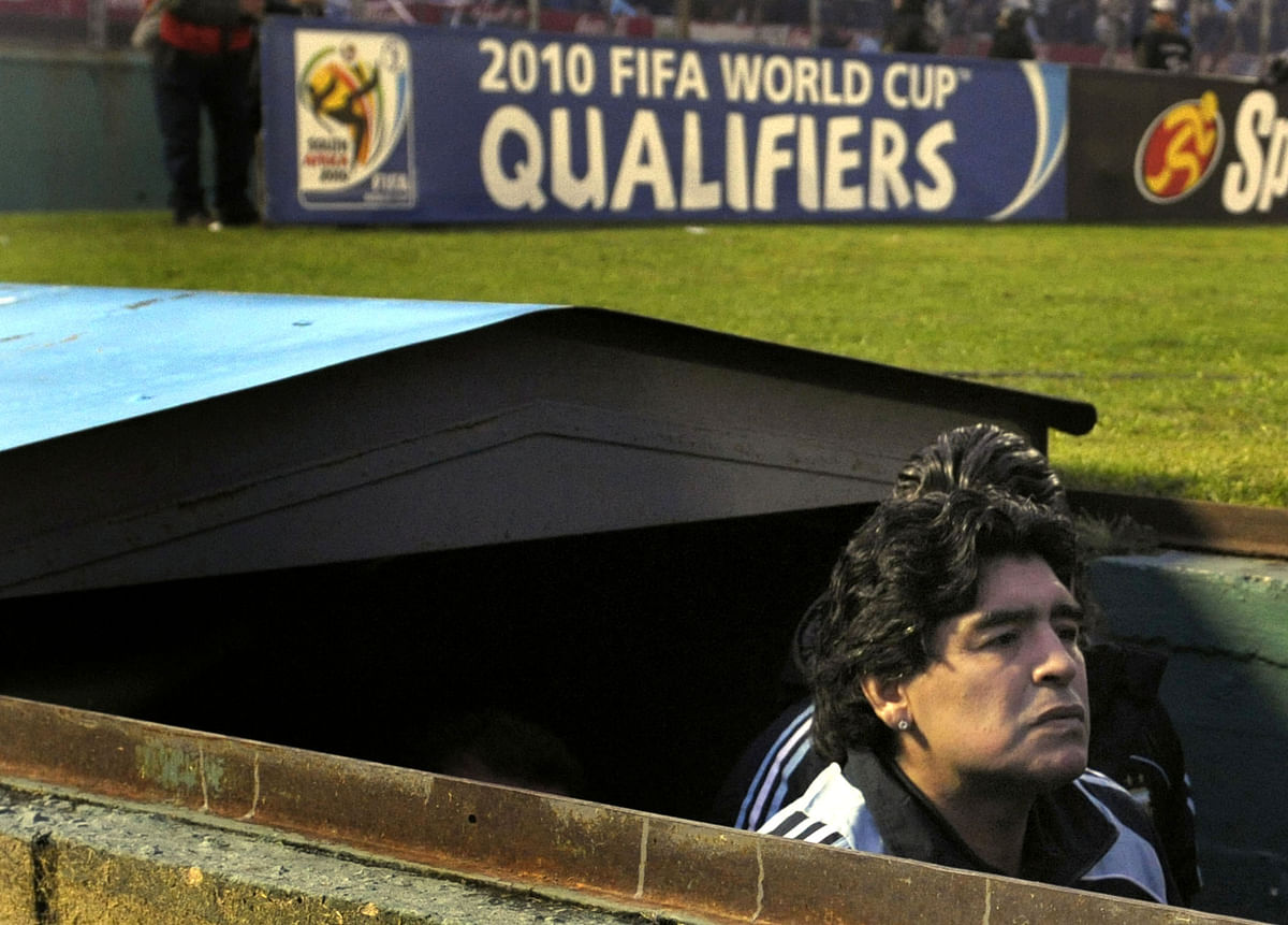 Argentina's coach Diego Maradona walks into the field before the start of the FIFA World Cup South Africa-2010 qualifier football match against Uruguay at the Centenario stadium in Montevideo, Uruguay on October 14, 2009. Photo: AFP
