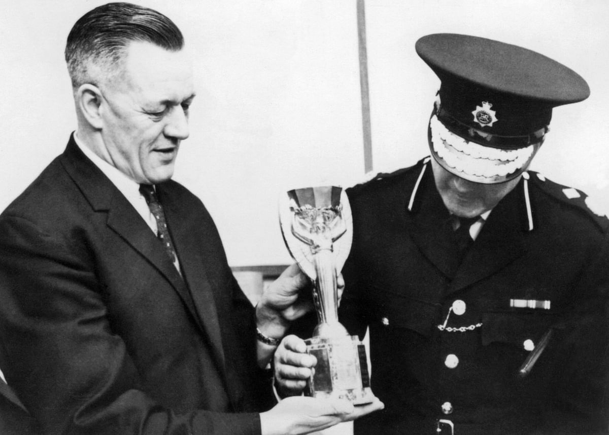 The Jules Rimet Cup found by a dog named "Pickles", on 28 March 1966 in a garden in suburban London, is shown to journalists by two Scotland Yard police officers. The cup was given to the captain of the winning soccer team at the end of each World Cup, had been stolen by an unemployed docker during an exhibit. After its recovery, it was kept in a safe place and presented by Queen Elizabeth to English captain Bobby Moore on 11 July 1966 at Wembley stadium in London after England defeated Germany 4-2 in extra time to earn its first World title. Photo: AFP