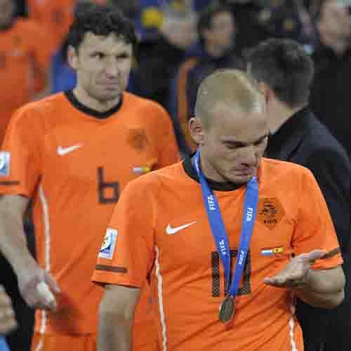 Netherlands' midfielder Wesley Sneijder reacts with his silver medal after losing the 2010 FIFA football World Cup final to Spain in extra time on July 11, 2010 at Soccer City stadium in Soweto, suburban Johannesburg. Spain won the match 1-0. Photo: AFP