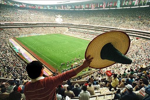 A Mexican fan waves a sombrero as he waits with thousands of fans for the start of the opening ceremony of the 13th World Cup on 30 June 1986 at the Aztec stadium in Mexico City. 24 teams are participating in the competition scheduled from 31 May to 29 June. Photo: AFP