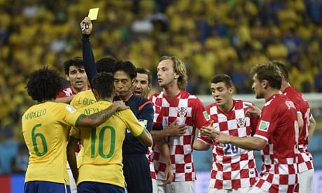 Neymar picks up the first yellow card for flinging his arm into the face of Luka Modric. Photo: AFP