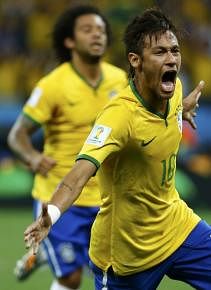 Brazil's Neymar celebrates his goal against Croatia during their 2014 World Cup opening match at the Corinthians arena in Sao Paulo on June 12, 2014. Photo: Reuters