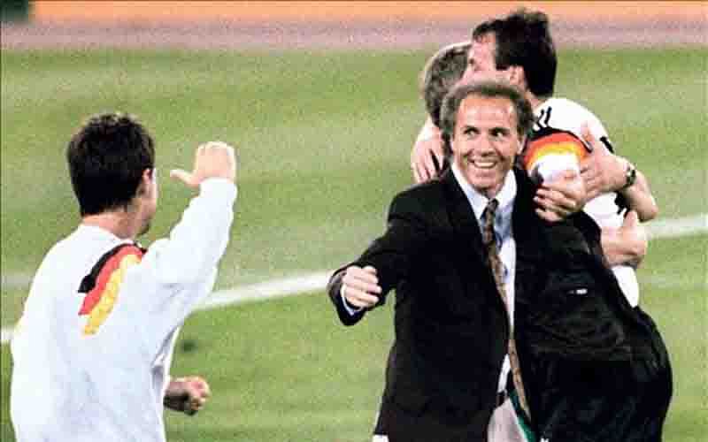 West Germany's national soccer team coach Franz Beckenbauer (C) celebrates after his team beat the defending champions Argentina 1-0 on a penalty kick by defender Andreas Brehme in the World Cup final, 08 July 1990 in Rome. Photo: AFP