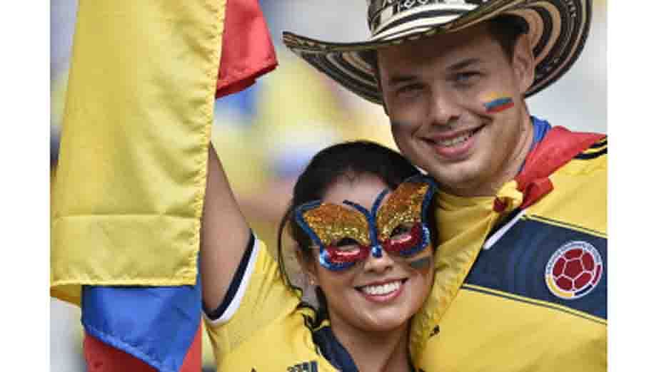 Colombia fans are pictured before a Group C football match between Colombia and Greece at the Mineirao Arena in Belo Horizonte during the 2014 FIFA World Cup on June 14, 2014. AFP