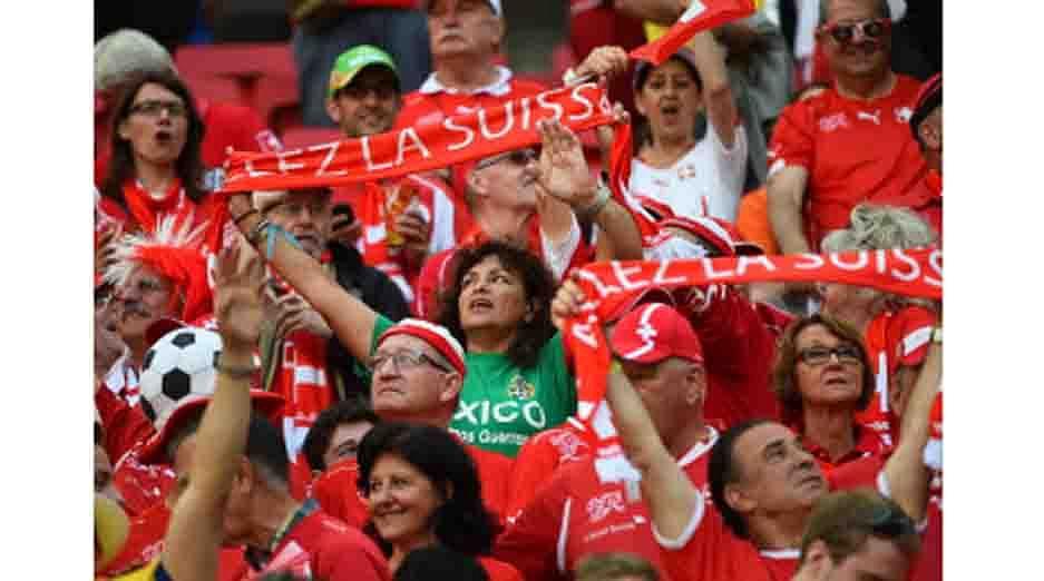 Swiss fans react during a Group E football match between Switzerland and Ecuador at the Mane Garrincha National Stadium in Brasilia during the 2014 FIFA World Cup on June 15, 2014. Switzerland won 2-1. AFP