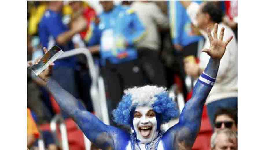 Honduras fans celebrate as they wait for the start of the 2014 World Cup Group E soccer match against France at the Beira-Rio stadium in Porto Alegre on June 15, 2014. Reuters