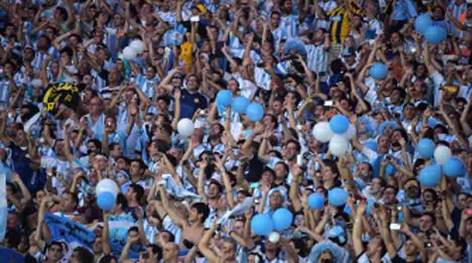 Argentine fans cheer for their team before the start of a Group F football match between Argentina and Bosnia Hercegovina at the Maracana Stadium in Rio De Janeiro during the 2014 FIFA World Cup on June 15, 2014. AFP