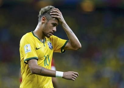 Brazil's Neymar reacts during their 2014 World Cup Group A soccer match against Mexico at the Castelao arena in Fortaleza on June 17, 2014. Reuters