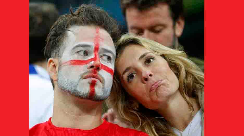 England fans react to their team losing to Uruguay during their 2014 World Cup Group D soccer match at the Corinthians arena in Sao Paulo on June 19, 2014. Reuters