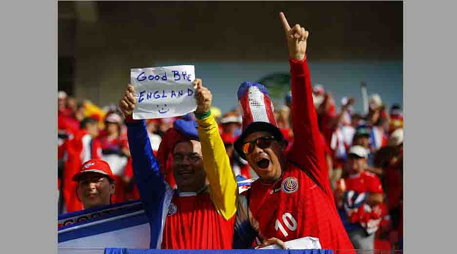 Fans of Costa Rica celebrate at the end of their 2014 World Cup Group D soccer match against Italy at the Pernambuco arena in Recife on June 20, 2014. Reuters