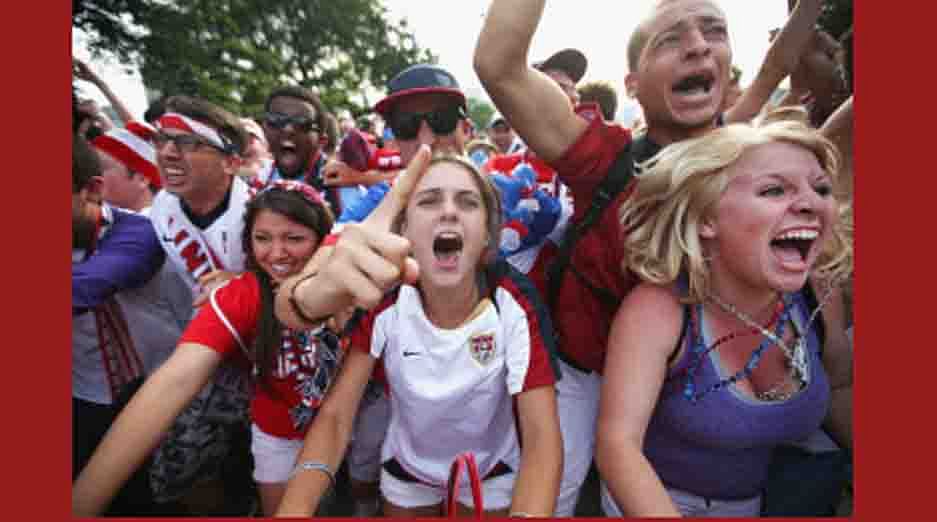 Fans in Grant Park celebrate a goal by the U.S. against Portugal in a Group G World Cup soccer match on June 22, 2014 in Chicago, Illinois. AFP