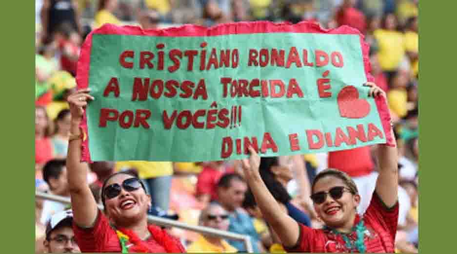 Portugal fans are pictured before the start of a Group G match between USA and Portugal at the Amazonia Arena in Manaus during the 2014 FIFA World Cup on June 22, 2014. AFP