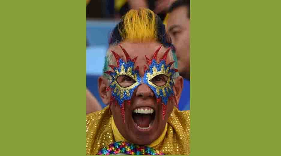 A Colombia fan cheers prior to the Group C football match between Japan and Colombia at the Pantanal Arena in Cuiaba during the 2014 FIFA World Cup in Brazil on June 24, 2014. AFP