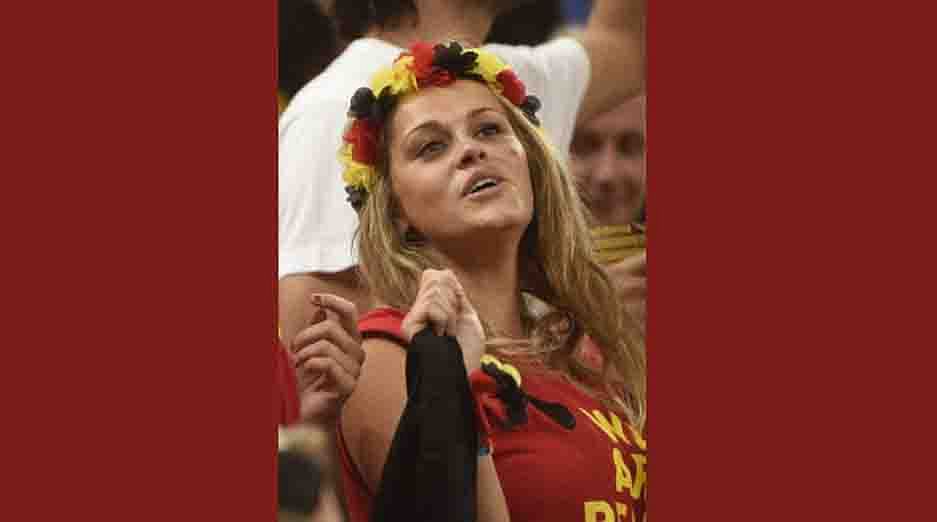 A Belgian fan celebrates their victory at the end of a Group H football match between South Korea and Belgium at the Corinthians Arena in Sao Paulo during the 2014 FIFA World Cup on June 26, 2014. Belgium won 1-0. AFP