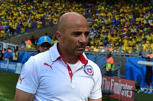 Chile's Argentinian coach Jorge Sampaoli watches the Round of 16 football match between Brazil and Chile at The Mineirao Stadium in Belo Horizonte during the 2014 FIFA World Cup on June 28, 2014. AFP