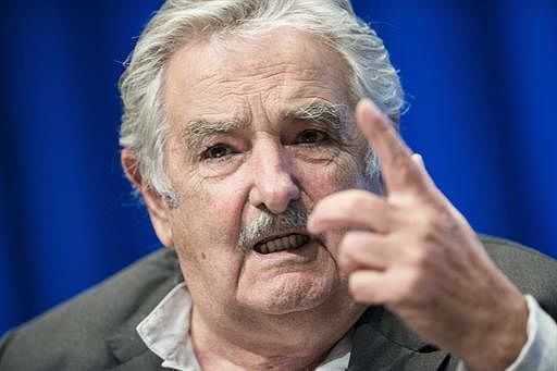 Uruguayan President Jose Mujica speaks at the World Bank on May 14, 2014 in Washington, DC. Mujica and Jorge Familiar, World Bank Vice President for Latin America and the Caribbean spoke about regional issues. AFP