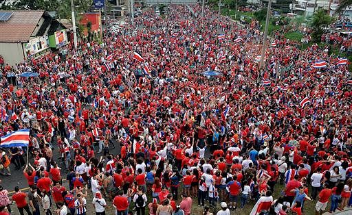 Costa Rica fans celebrate in San Jose on June 29, 2014 after their team defeated Greece in the Brazil 2014 FIFA World Cup Round of 16 football match and qualified for quarterfinals. AFP