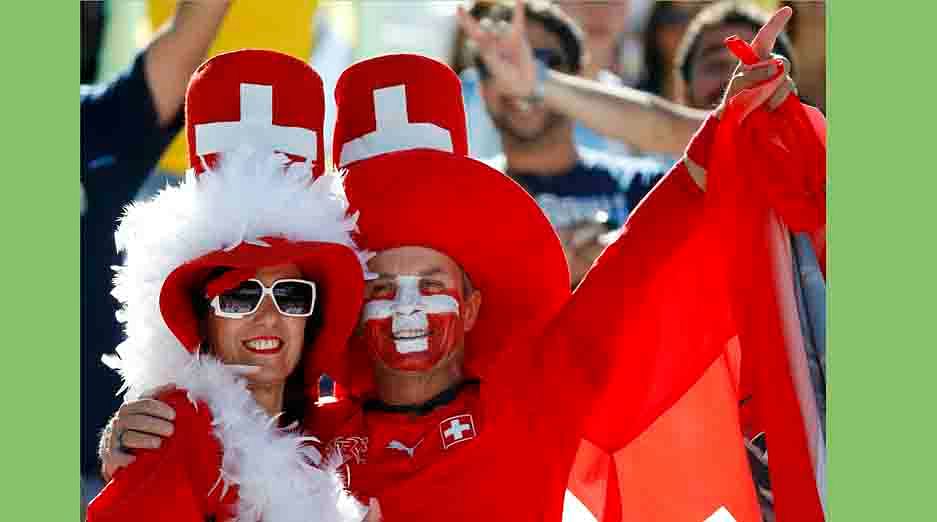 Fans of Switzerland cheer before their 2014 World Cup round of 16 game against Argentina at the Corinthians arena in Sao Paulo on July 1, 2014. Reuters