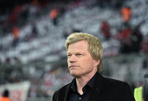 Former German national football team goalkeeper Oliver Kahn stands on the pitch prior to the UEFA Champions League quarter-final second leg football match Bayern Munich vs Manchester United in Munich, southern Germany, on April 9, 2014. AFP