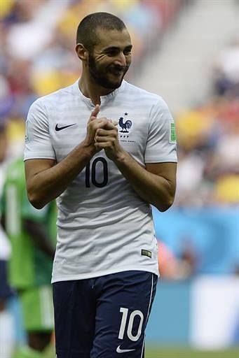 France's forward Karim Benzema reacts during the round of 16 football match between France and Nigeria at the Mane Garrincha National Stadium in Brasilia during the 2014 FIFA World Cup on June 30, 2014. AFP