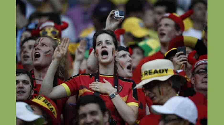 Belgian supporters cheer for their team ahead of the Round of 16 football match between Belgium and USA at The Fonte Nova Arena in Salvador on July 1, 2014, during the 2014 FIFA World Cup. AFP