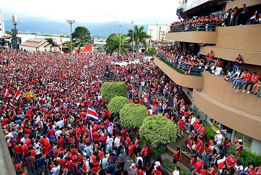 Costa Rica fans celebrate in San Jose on June 29, 2014 after their team defeated Greece in the Brazil 2014 FIFA World Cup Round of 16 football match and qualified for quarterfinals. AFP